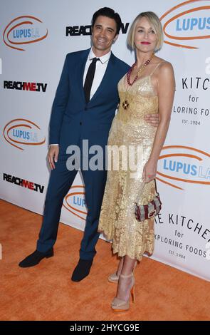 Gilles Marini and Sharon Stone arriving for Lupus LA's 2017 Orange Ball: Rocket To A Cure held at the California Science Center in Los Angeles, USA Stock Photo