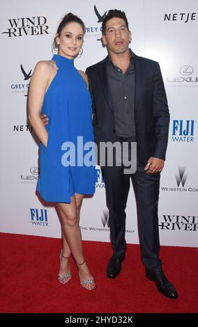 Sarah Wayne Callies and Jon Bernthal attends the 'Wind River' Los Angeles Premiere held at the Theatre at ACE Hotel Stock Photo