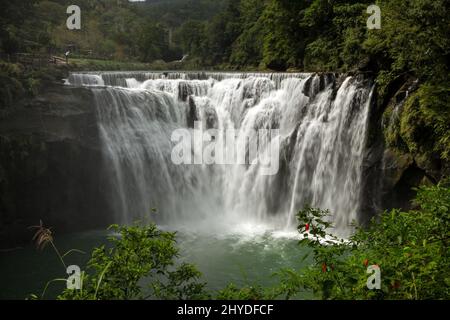 Scenic view of the Shifen Waterfall along the Keelung River in Pingxi District, New Taipei City, Taiwan. Stock Photo