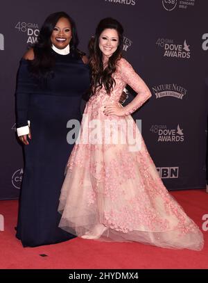 Tasha Cobbs Leonard and Kari Jobe attending at the 48th Annual GMA Dove Awards held at the Lipscomb University's Allen Arena in Los Angeles, USA Stock Photo