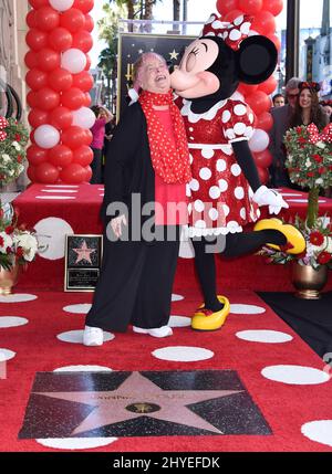 Voice actress Russi Taylor and Minnie Mouse. Minnie Mouse Celebrates 90th Anniversary With Star On The Hollywood Walk Of Fame. Stock Photo