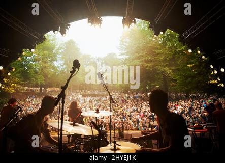 Ready to rock. Cropped shot of a musicians feet on stage at an outdoor music festival. Stock Photo