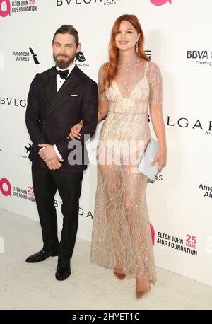 Jennifer Akerman, Tom Payne attending the Elton John AIDs foundation Oscar Party held in Beverly Hills, Los Angeles, USA Stock Photo