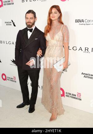 Jennifer Akerman, Tom Payne attending the Elton John AIDs foundation Oscar Party held in Beverly Hills, Los Angeles, USA Stock Photo