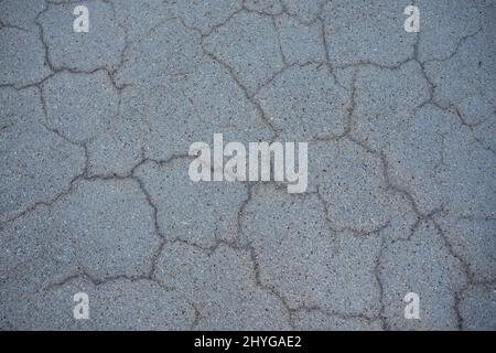 Surface of grey cracked asphalt. Tarmac, road. Texture Background, Top view Stock Photo
