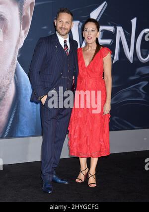 Tom Hardy and Kelly Marcel arriving for the 'Venom' premiere held at Regency Village Theatre in Westwood, Los Angeles on October 1, 2018 Stock Photo