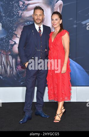 Tom Hardy and Kelly Marcel arriving for the 'Venom' premiere held at Regency Village Theatre in Westwood, Los Angeles on October 1, 2018 Stock Photo