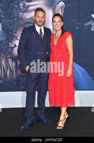 Tom Hardy and Kelly Marcel arriving for the 'Venom' premiere held at Regency Village Theatre in Westwood, Los Angeles on October 1, 2018 Stock Photo