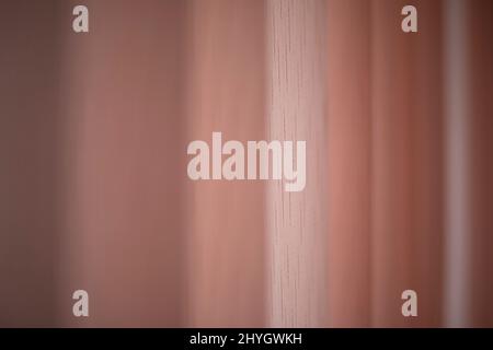 Texture of blinds. Light from window. Blinds on window in room. Pink curtains. Stock Photo