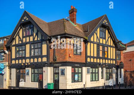 London, UK - April 19, 2021 - The exterior of an English pub in mock Tudor style around Canada Water Stock Photo