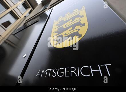 Karlsruhe, Germany. 15th Mar, 2022. In front of the Karlsruhe District Court, the lettering Amtsgericht and the coat of arms of Baden-Württemberg are displayed on a mailbox. A trial for tax evasion amounting to millions of euros was opened in the court. The defendant, a former managing director of a now insolvent kebab skewer manufacturer, is alleged to have evaded taxes in eight cases from 2017 to 2019 with a total loss amounting to millions. Credit: Uli Deck/dpa/Alamy Live News Stock Photo