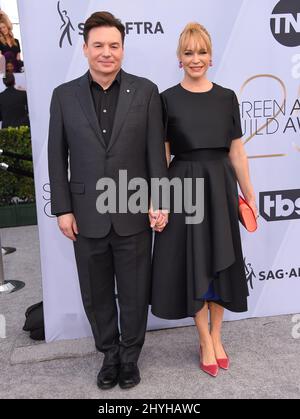 Mike Myers and Kelly Tisdale attending the 25th Annual Screen Actors Guild Awards held at the Shrine Auditorium Stock Photo