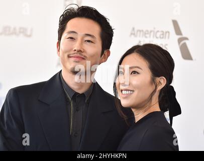 Steven Yeun and Joana Pak at the 2019 Film Independent Spirit Awards held on Santa Monica Beach on February 23, 2019 in Santa Monica, CA. Stock Photo