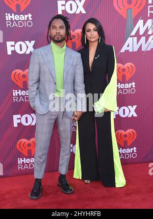 Miguel and Nazanin Mandi at the 2019 iHeartRadio Music Awards held at Microsoft Theatre L.A. Live on March 14, 2019 in Los Angeles Stock Photo