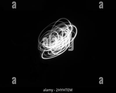 Abstract light dot background. Light painting fine art photo of a circle made with a white whirlwind line Stock Photo