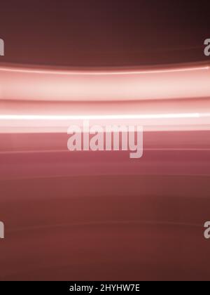 Abstract pink lights background. Light painting orbital blurry shapes Stock Photo