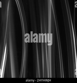 Abstract tubes background. Black and white fine art abstract of tubes made with light painting technique Stock Photo