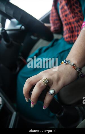 Delhi, India. 1st Sep, 2016. A female taxi driver shifts gears as she drives through Delhi. Azad Foundation in Delhi offers training for women of vulnerable backgrounds who want to become taxi drivers. (Credit Image: © Ana Norman Bermudez/SOPA Images via ZUMA Press Wire) Stock Photo