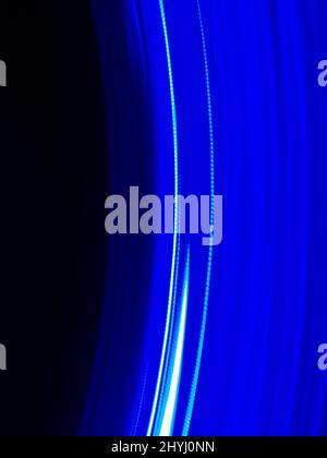 Blue energetic circular movement on deep space dark background abstract photography Stock Photo