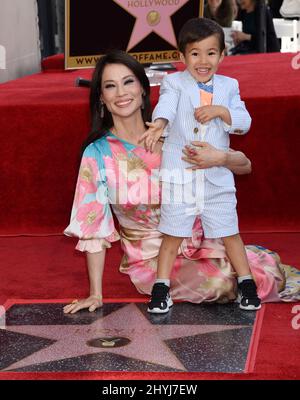 Lucy Liu is joined by Rockwell Lloyd Liu at her Hollywood Walk of Fame star ceremony on May 1, 2019 in Hollywood, CA. Stock Photo