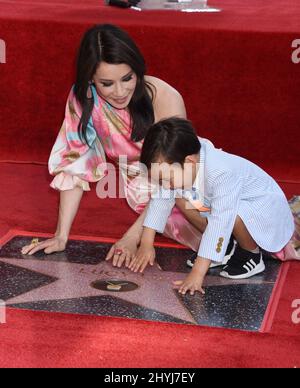 Lucy Liu is joined by Rockwell Lloyd Liu at her Hollywood Walk of Fame star ceremony on May 1, 2019 in Hollywood, CA. Stock Photo