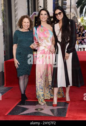 Lucy Liu is joined by Demi Moore and Rhea Perlman at her Hollywood Walk of Fame star ceremony on May 1, 2019 in Hollywood, CA. Stock Photo