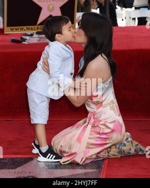 Lucy Liu is joined by Rockwell Lloyd Liu at her Hollywood Walk of Fame star ceremony on May 1, 2019 in Hollywood, CA. Stock Photo