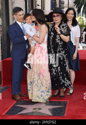 Lucy Liu is joined by John Liu, Rockwell Lloyd Liu, Cecilia Liu and Jenny Liu at her Hollywood Walk of Fame star ceremony on May 1, 2019 in Hollywood, CA. Stock Photo