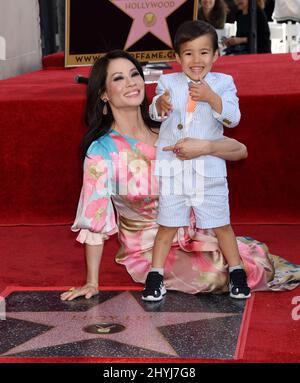 Lucy Liu is joined by Rockwell Lloyd Liu at her Hollywood Walk of Fame star ceremony on May 1, 2019 in Hollywood, CA. Stock Photo