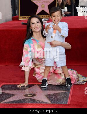 Lucy Liu is joined by Rockwell Lloyd Liu at her Hollywood Walk of Fame star ceremony on May 1, 2019 in Hollywood, CA. Stock Photo