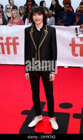 Finn Wolfhard arrives at the premiere of 