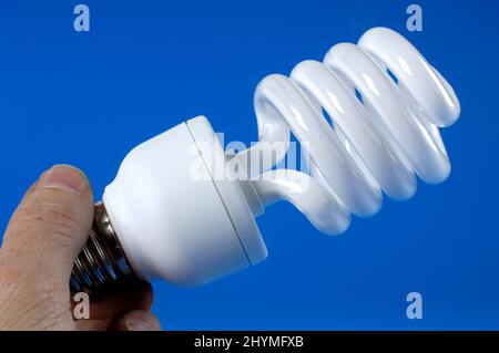 energy-efficient lamp in a hand Stock Photo