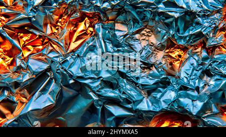 Aluminium foil, complementary, orange and blue, cold-warm, background image Stock Photo