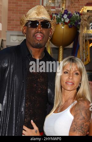 Dennis Rodman wife Michelle Moyer attend the Pirates Of The