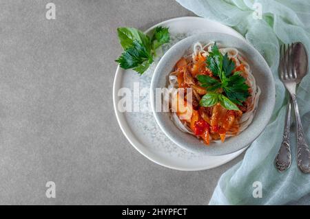 Hot Uighur dish served with herbs and spices. Stock Photo