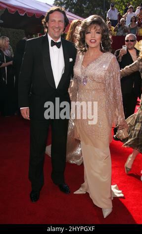 Joan Collins & Percy Gibson attend the 58th Annual Primetime EMMY Awards at The Shrine Auditorium. Picture: UK Press Stock Photo