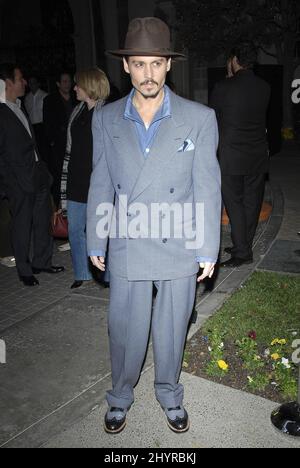 Johnny Depp attends the premiere of 'Sweeney Todd: The Demon Barber of Fleet Street' at the Paramount Studios Theater in Hollywood, CA. Stock Photo