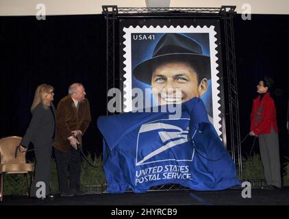 Frank Sinatra Jr., Nancy Sinatra and Tina Sinatra at a sneak preview of Frank Sinatra's US Postage Stamp held at the Beverly Hilton Hotel in Los Angeles. Stock Photo