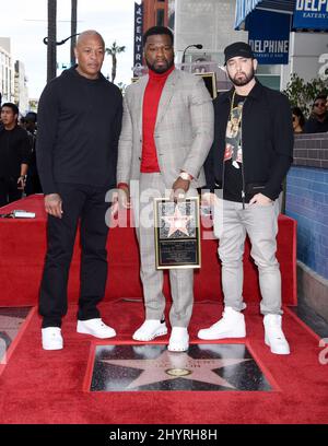Dr Dre is in ICU after suffering a brain aneurysm on Monday in Los Angeles, Ca. Curtis '50 Cent' Jackson, Dr Dre and Eminem is joined by Dr Dre and Eminem at his Hollywood Walk of Fame star ceremony on January 30, 2020 in Hollywood, CA. Stock Photo