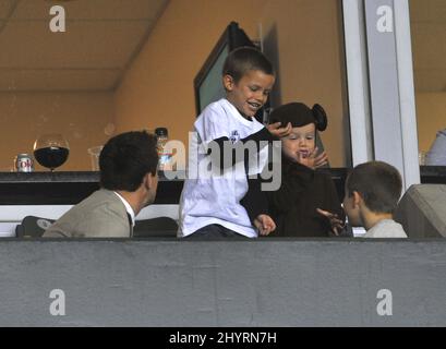 Romeo, Cruz and Brooklyn Beckham watch their Dad play for LA Galaxy at the The Home Depot Center in Los Angeles. Stock Photo