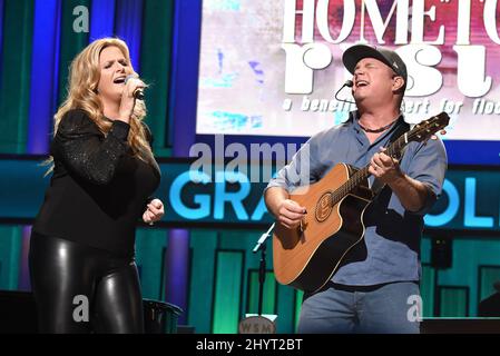 Trisha Yearwood and Garth Brooks performing onstage at Loretta Lynn's Friends: Hometown Rising benefit concert with proceeds benefiting the United Way of Humphreys County on September 13, 2021 in Nashville, TN. Stock Photo