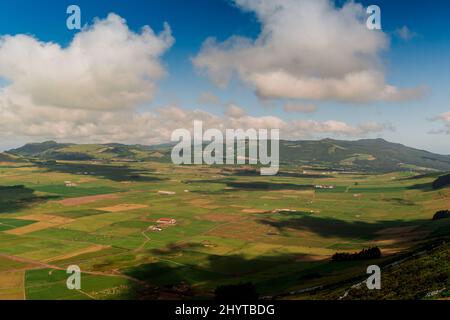 Scenic shot of green fields from the viewpoint of Serra do Cume in Terceira, Azores, Portugal Stock Photo