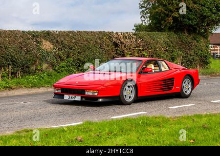 1991 90s nineties red Ferrari Testarossa 4953cc petrol Italian sports car. Type F110 a 12-cylinder 4943cc mid-engine sports car Stock Photo