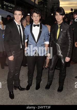 Joe Jonas, Nick Jonas and Kevin Jonas of the Jonas Brothers at the 'Jonas Brothers: 3D Concert Experience' World Premiere at El Capitan Theatre in Hollywood, CA. Stock Photo