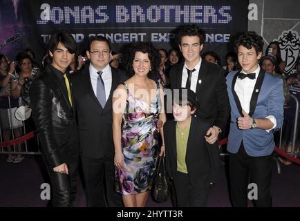 Joe Jonas, Nick Jonas and Kevin Jonas of the Jonas Brothers with parents Kevin and Denise and little brother Frankie Jonas at the 'Jonas Brothers: 3D Concert Experience' World Premiere at El Capitan Theatre in Hollywood, CA. Stock Photo