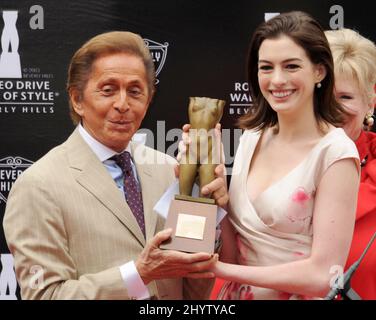 Valentino Garavani and Anne Hathaway at the Rodeo Drive Walk of Style Induction ceremony, Los Angeles, USA Stock Photo