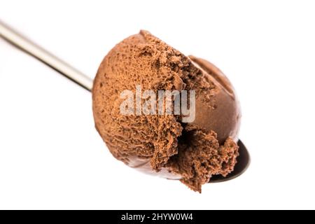 spoon full with chocolate ice cream isolated on white background Stock Photo