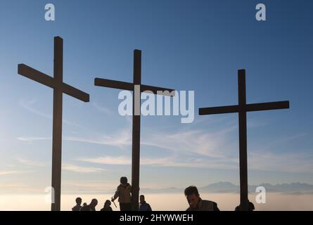 tourists and three crosses viewpoint, Brunate, Como, Lombardy, Italy Stock Photo