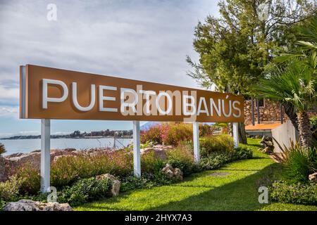 Puerto Banus sign in famouse travel destination and luxury harbour of  Marbella - Costa del Sol. Shopping area, restaurants, night lifestyle.  Stock Photo