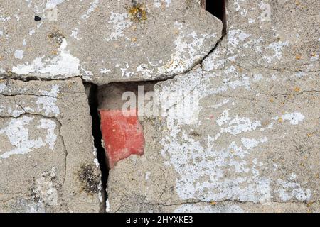 Old ruined brick wall with cracks. High detailed texture background photo Stock Photo